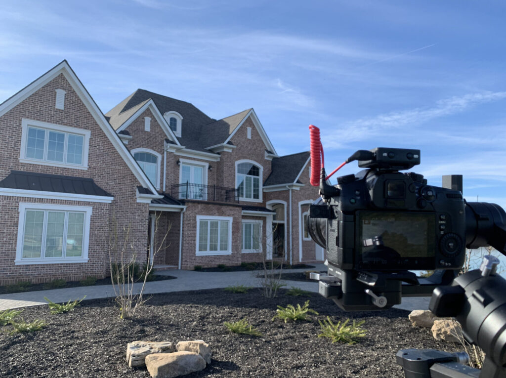 Photo of Video Camera filming real estate listing